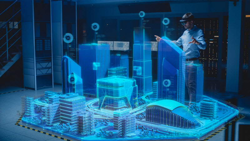 Modern Professional Architect Wearing Virtual Reality Headset Uses Gestures to Design, Manipulate Buildings for 3D City